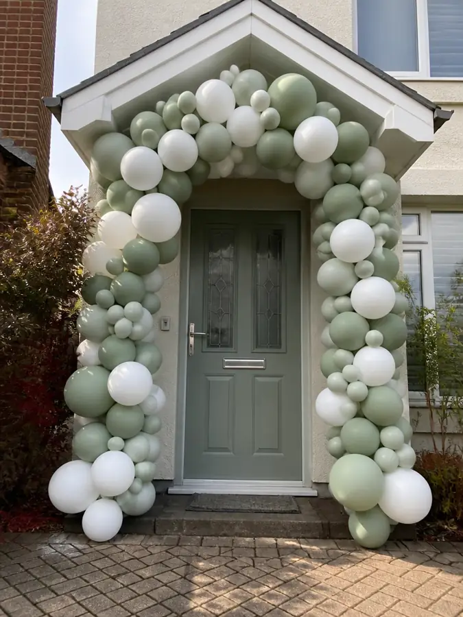 Balloon arch around a front door