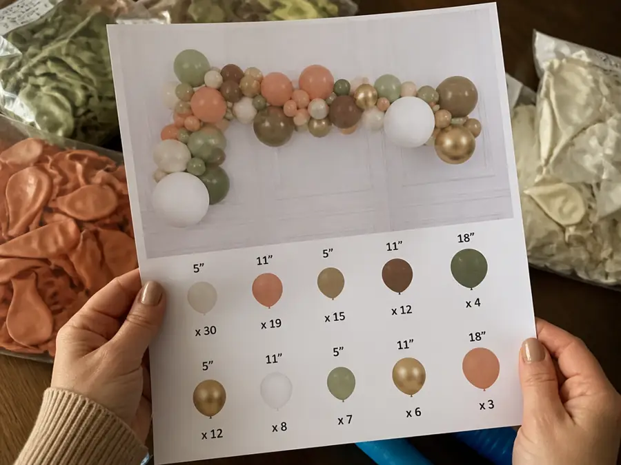 Holding a garland design sheet